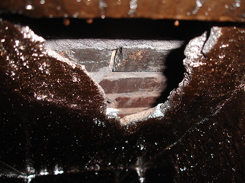 Broken Flue Liner repaired by The Chimney Sweep & Duct Cleaning, LLC. - King George, Virginia